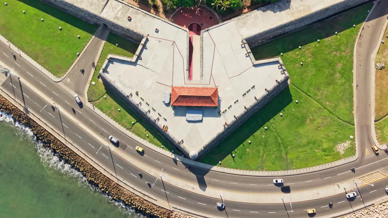 Slow motion aerial view of the historic cartagena city walls and old town in colombia