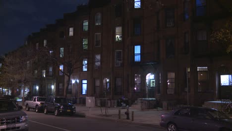 street level shot of building exteriors in brooklyn at night 1