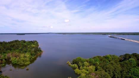 Aerial-Tilt-Up-Lake-Strom-Thurmond,-Clarks-Hill-Reservoir-with-Bridge-in-background