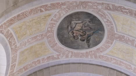 angelic fresco painting on the ornate ceiling inside bom jesus do monte church in braga, portugal