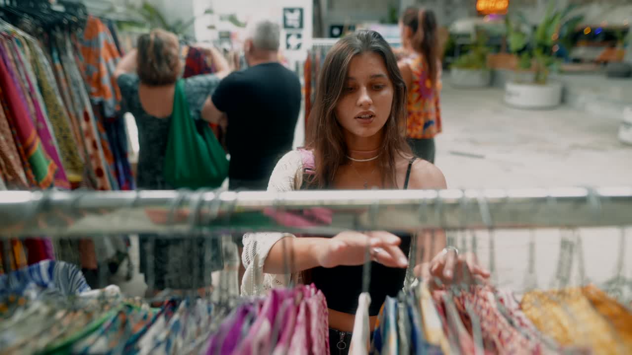 A woman shopping for clothes at a boutique