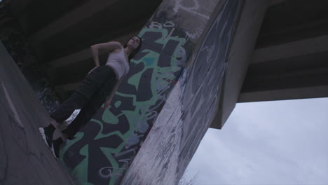 modern girl wearing street cloths. dutch, low angle