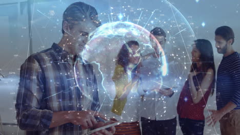 technology team analyzing network data in modern office, displaying digital holographic globe