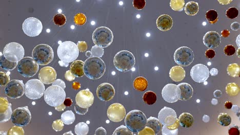 A-ceiling-decorated-by-colorful-glass-balls-in-a-large-hotel-in-El-Alamein,-Egypt-low-angle-shot