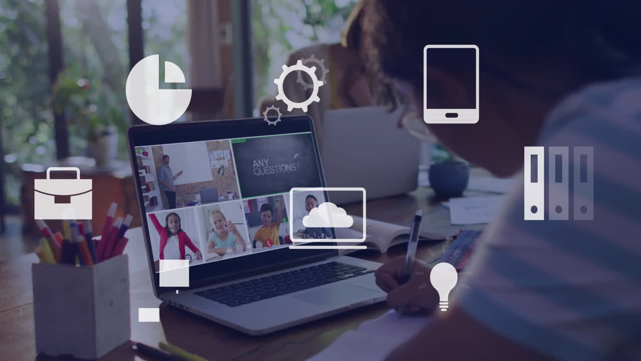 Studying with animation of digital icons on laptop screen in virtual school meeting