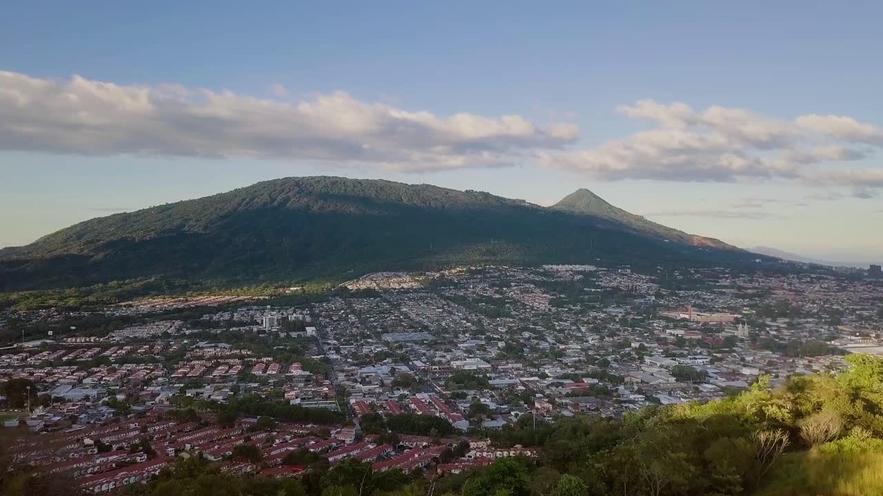 Beautiful Town Landscape View From Lush And Grassy Mountainside At Santa Tecla, El Salvador. - Wide Shot