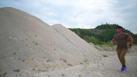 man exercising in a quarry