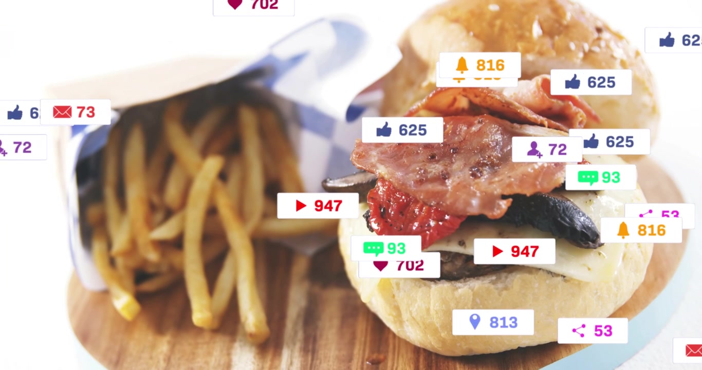 Red icon appearing, engagement badges animating onto sesame burger and fries, showing popularity