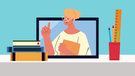maestra trabajadora en tabletas y libros
