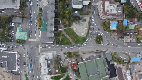 aerial view vertically down of traffic at an intersection with traffic lights