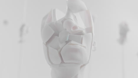 destroyed android head on spike in white space