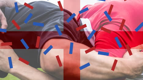 animación de la bandera de inglaterra y confeti sobre jugadores de rugby caucásicos en el estadio