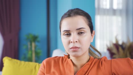 Portrait-of-unhappy-young-woman-with-glasses.