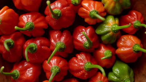 fresh chili pepper in a wooden bowl