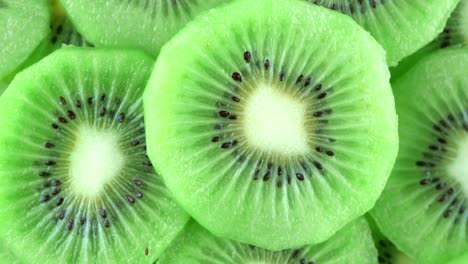 macro rotation video shooting of slice kiwi fruit .close up flesh of kiwi.