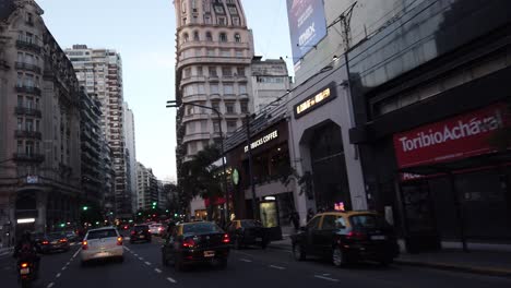 pov drive trough callao avenue north neighborhood of buenos aires city at sunset