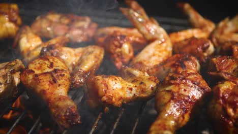 delicious chicken pieces frying on barbecue grill