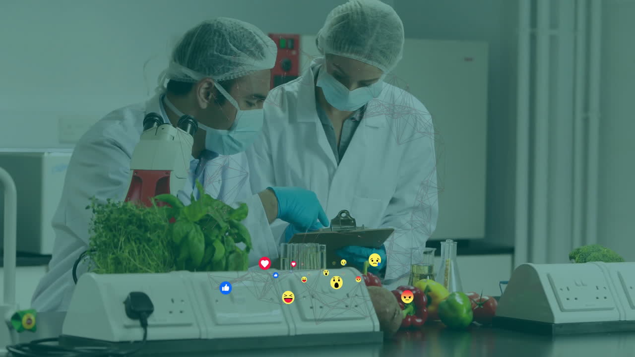 In school lab, scientists examining plants with animation of social media reactions