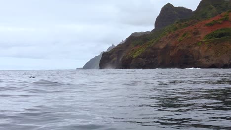 dramatic ocean view with rugged cliffs under an overcast sky