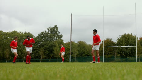 rugby player taking a kick and scoring