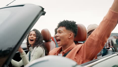 friends enjoying a road trip in a convertible
