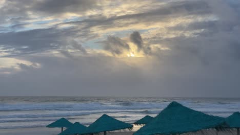 wide-view-of-sea-during-sunset-in-the-Atlantic-Ocean-in-Costa-da-Caparica,-Lisbon,-Portugal