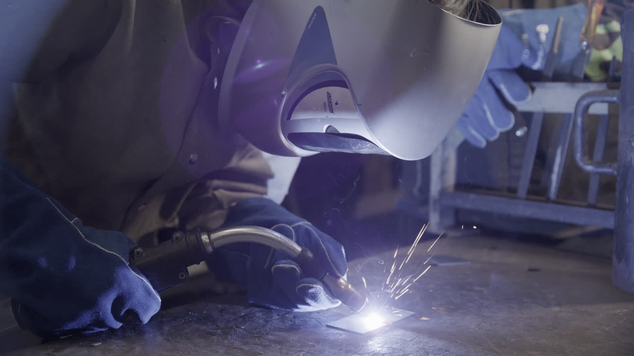 Welder slow motion close up