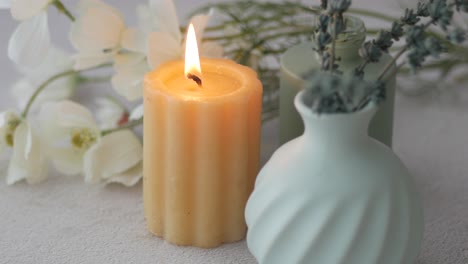 candle and floral still life
