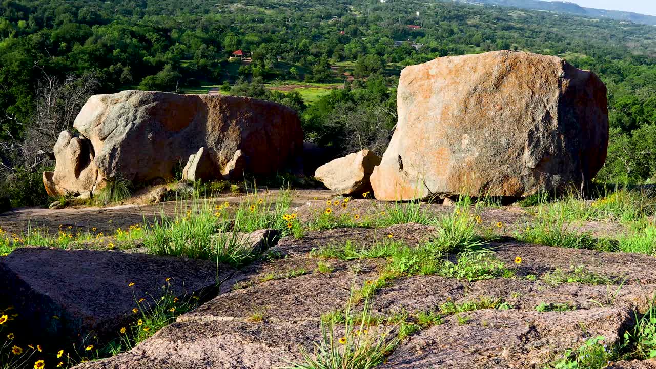 Static video of 2 massive boulders at Enchanted Rock near Fredericksburg, Texas