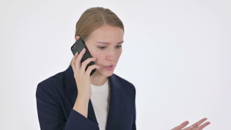 aggressive young businesswoman angry on smartphone on white background