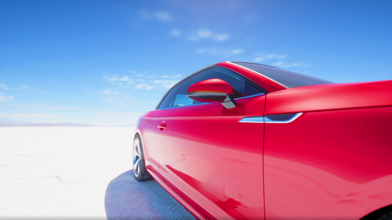 coche deportivo convertible rojo en un piso de sal