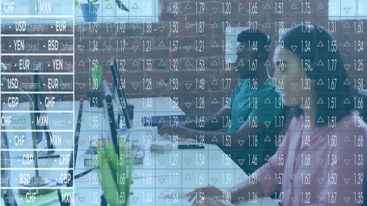 coworkers typing on laptops at modern office desk, showing animated currency exchange rates overlay
