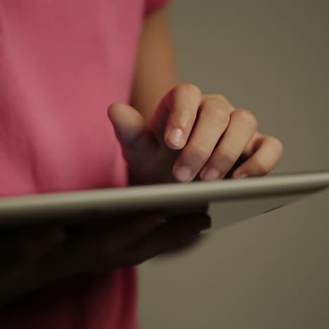 Girl with a tablet in the hands.