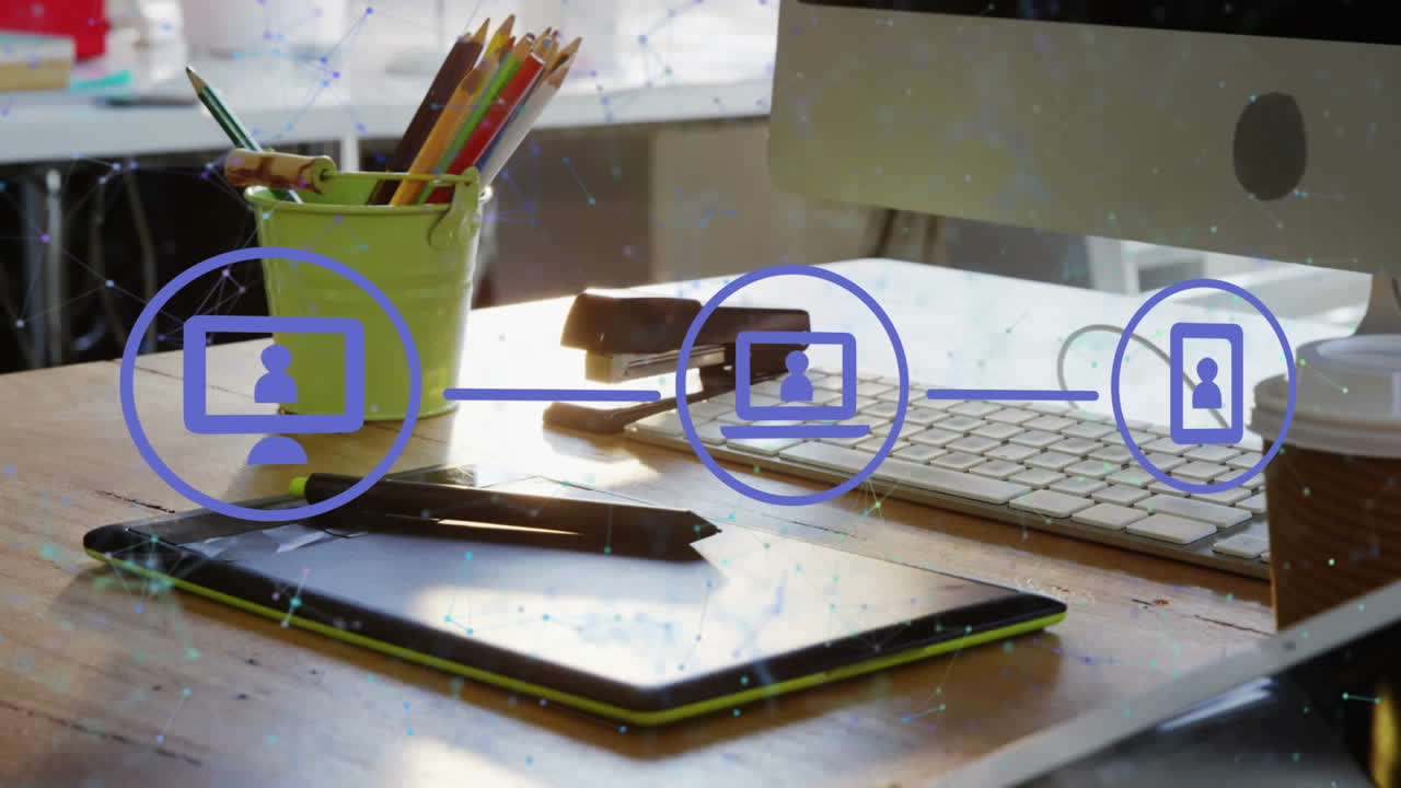 Animation of media icons and shapes over computer on table in office