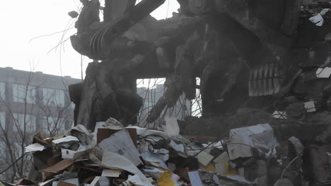 an excavator removes debris