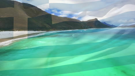 digital composition of greece flag waving against aerial view of waves in the sea