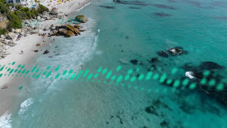 animation of data processing over aerial view of sea waves and the beach