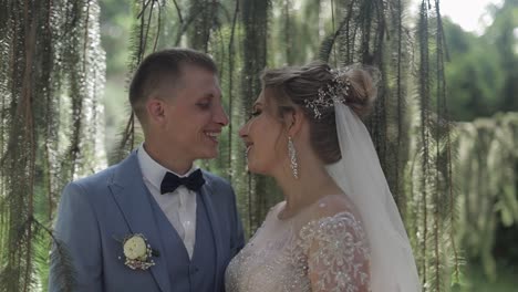 Newlyweds.-Caucasian-groom-with-bride-in-the-park.-Wedding-couple.-Happy-family