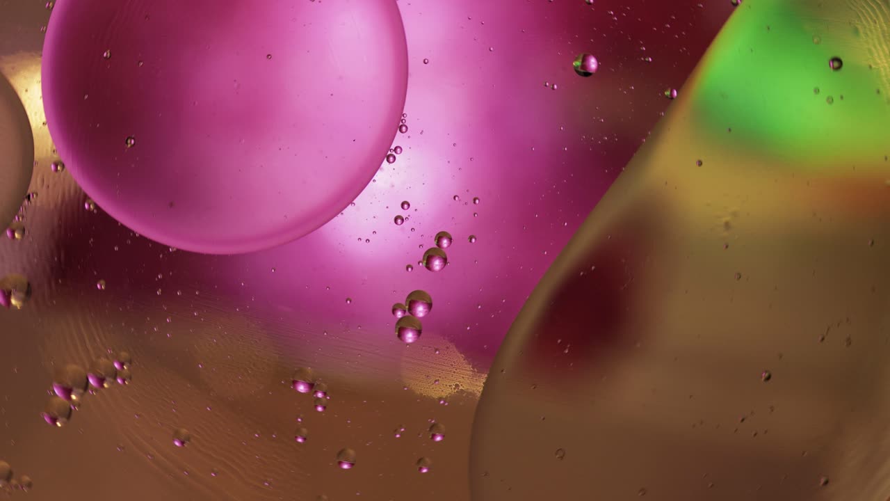 la macroestructura de las burbujas de aceite coloridas. movimiento caótico. fondo multicolor abstracto. patrón