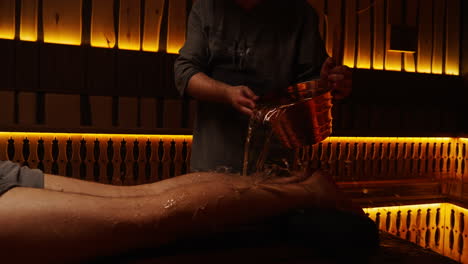 water pouring treatment in a sauna