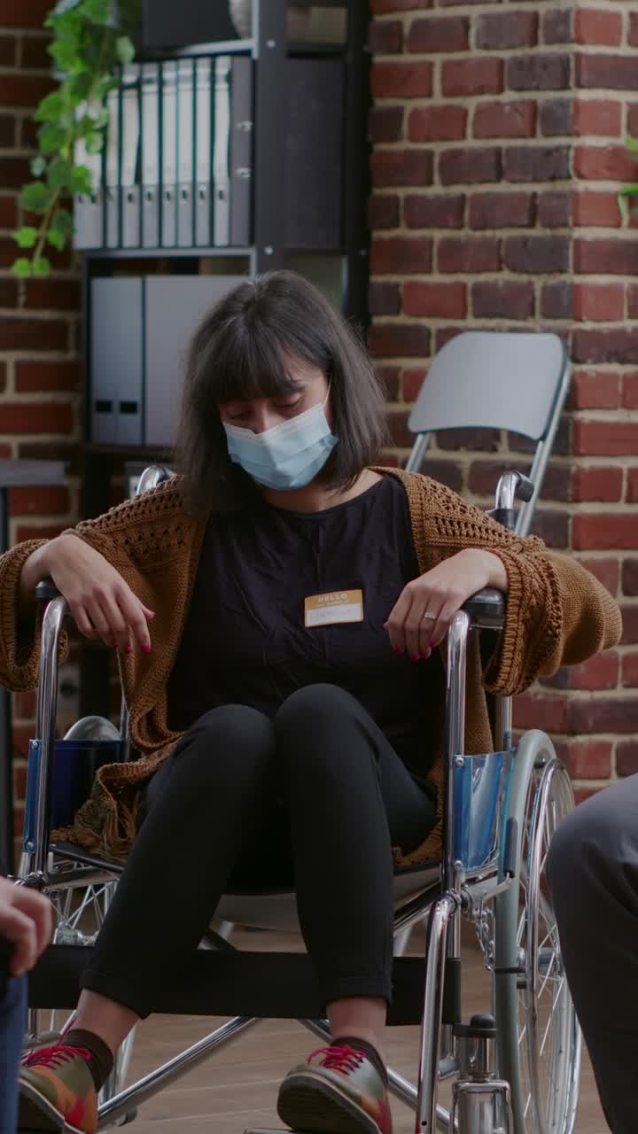 Woman in Wheelchair Attending Therapy Session