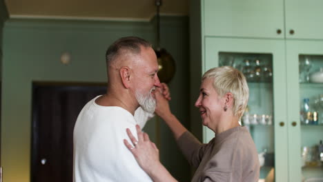 couple dancing at home