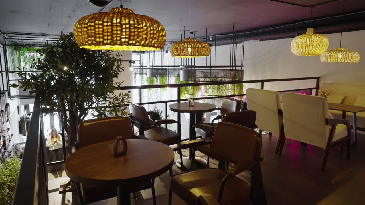 Modern Cozy Cafe Interior with Hanging Lights