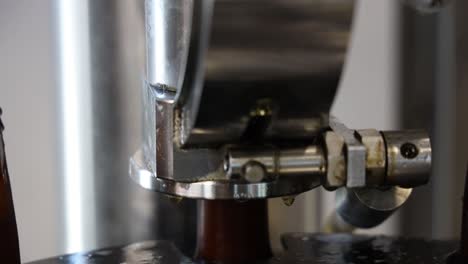 the distillery machine bottling beer in a storage