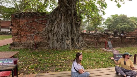 tourists taking photos at historical site