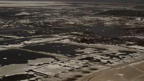 a drone, aerial, cinematic, landscape, wide-angle view of the salt valley in california