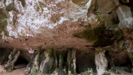 natural cave formations with stalactites and stalagmites