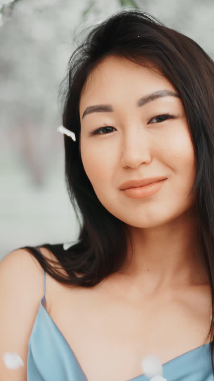 Asian Woman in Spring Flowers