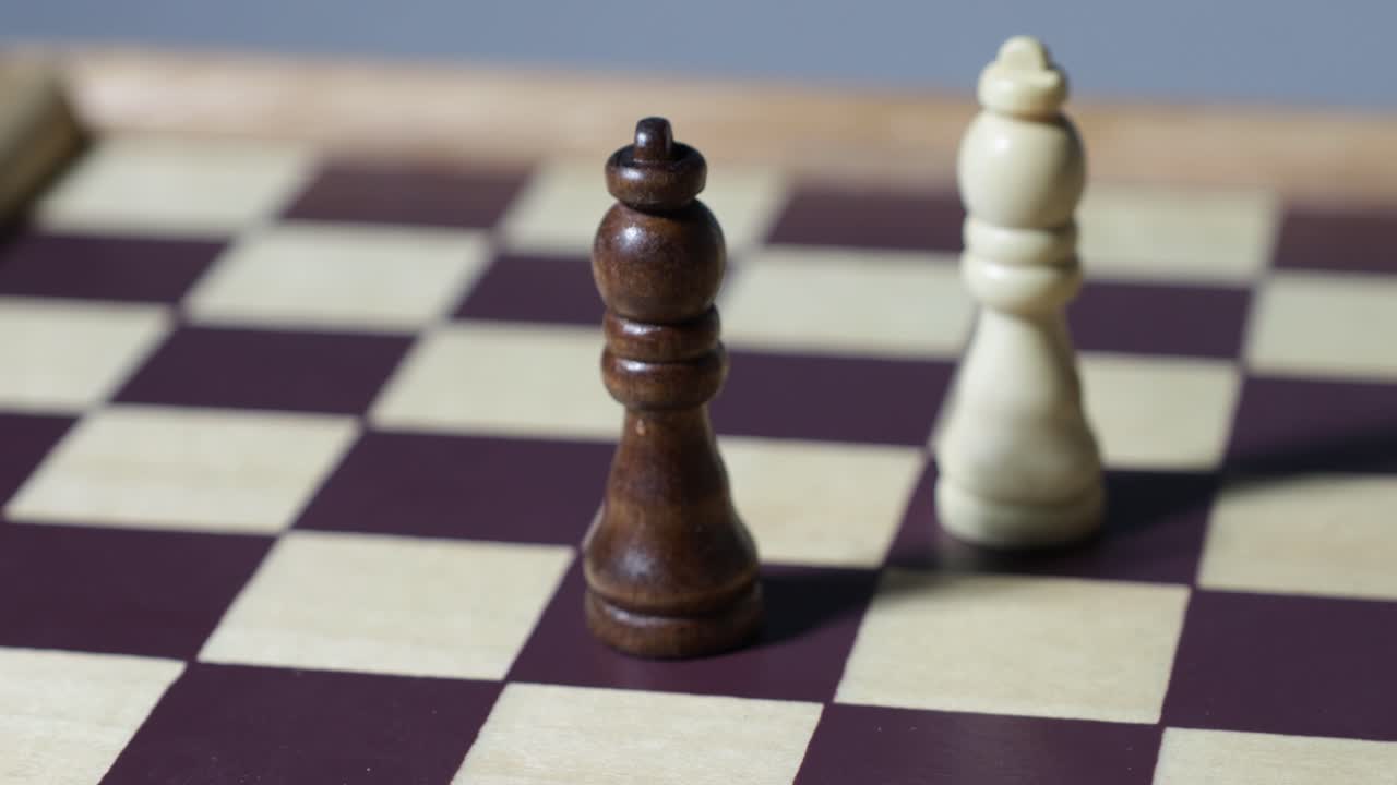 Rotating cinematic shot of chess queens, dancing shadows on a chessboard