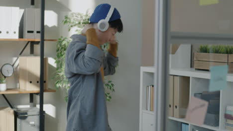 woman dancing in office